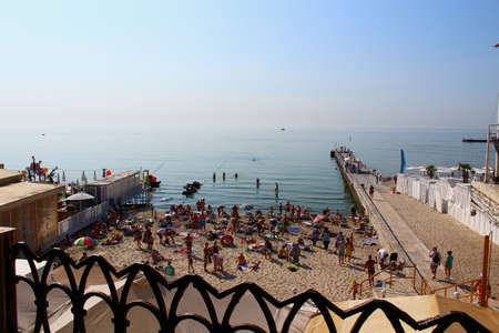 Odessa, Ukraine July 28, 2019, People on the city beach sunbathe in the midst of the tourist season. Editorial Use Onlyのeditorial素材