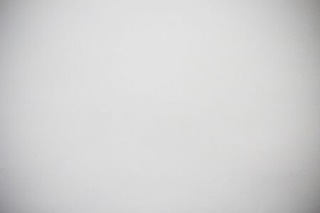 Blank textured sheet of colored paper to place the inscription or text backgroundの写真素材