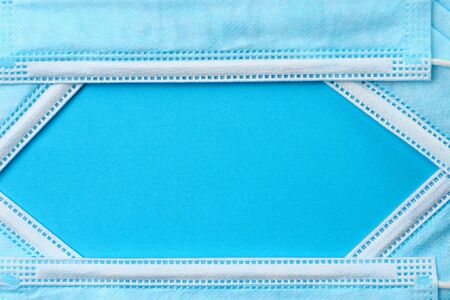 Abstract space forming frame for text or inscription made of medical surgical masks