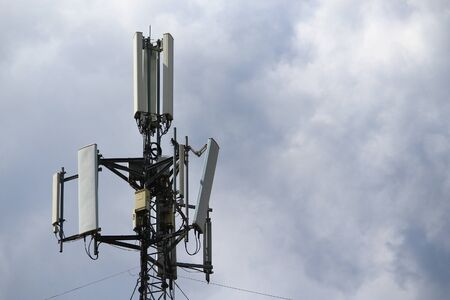 5G mobile phone tower. High Speed Broadband. Wireless cellular network. Signal data.の写真素材