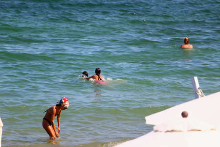 Odessa, Ukraine July 26, 2019,People on the city beach sunbathe in the midst of the tourist season . Editorial Use Onlyのeditorial素材