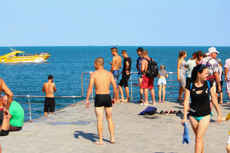 Odessa, Ukraine July 28, 2019, People on the city beach sunbathe in the midst of the tourist season. Editorial Use Onlyのeditorial素材