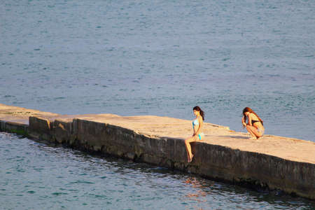 Odessa, Ukraine July 24, 2019, People on the city beach sunbathe in the midst of the tourist season. Editorial Use Onlyのeditorial素材