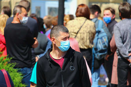Balti Moldova May 19, 2020 People use masks in an urban environment to protect them. Editorial Use Onlyのeditorial素材