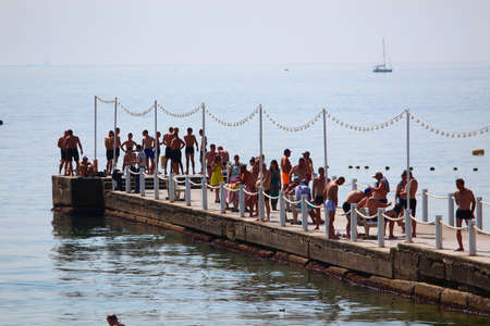 Odessa, Ukraine July 28, 2019, People on the city beach sunbathe in the midst of the tourist season. Editorial Use Onlyのeditorial素材