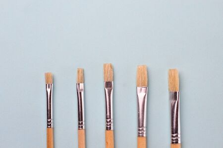 Artistic flat brushes of different widths for lettering or drawing. Creative backgroundの写真素材