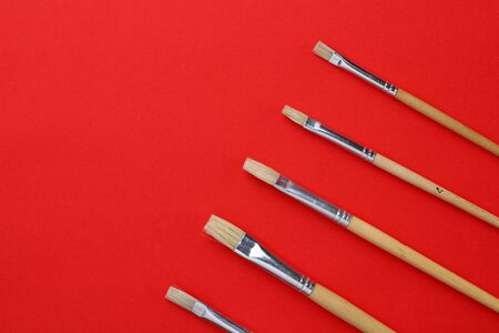 Artistic flat brushes of different widths for lettering or drawing. Creative backgroundの写真素材