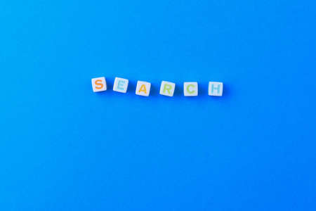 Cubes form the text Search on the classic blue medical background.の写真素材