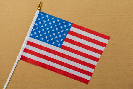 American small flag on craft cardboard. Abstract background.