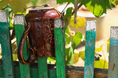 Pickets of an old wooden fence. Abstract background with selective focusの写真素材
