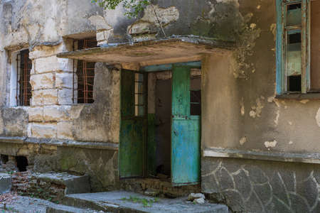Old scary grunge destroyed building post apocalyptic background