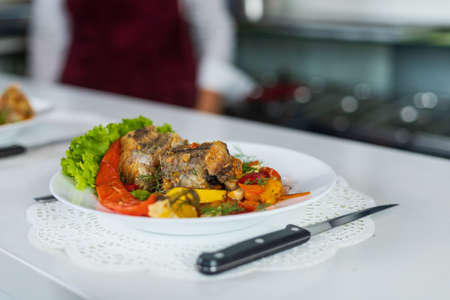 Sea fish stewed with vegetables. Cooking healthy dietary meals at home during the covid-19 lockdown....