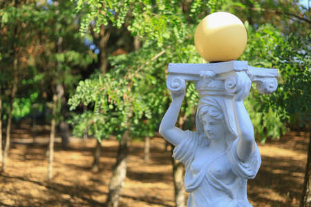 Decorating a garden, city park or leisure space. Decorative paraphernalia. Selective focus backgroundの写真素材