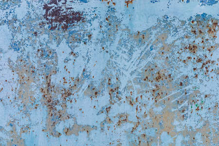 Old vintage retro grunge wall with peeling paint. Abstract shabby background