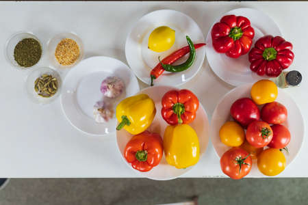 Abstract universal illustrative background with vegetables for cooking. Selective focus with blurred...