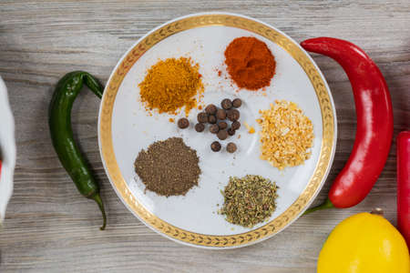 Various spices. Culinary background with selective focus and blurred background.の写真素材