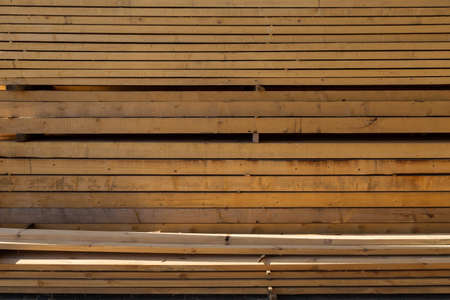 Sawed boards at the wholesale timber yard. Backgroundの写真素材