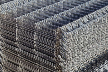 Metal mesh or lattice for quick fencing of the territory. Wholesale building store. Backgroundの写真素材