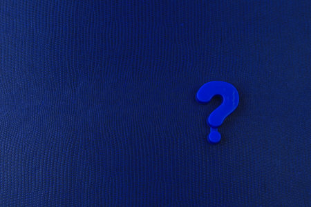 Question mark from childrens toy alphabet and copy space for caption or text