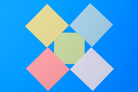 Blank stickers on a light blue background. Copy space for text or inscriptionの写真素材
