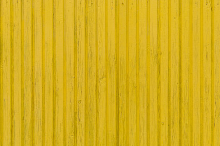 Old rough wood textured surface in trendy yellow. Background or template for design or graphic resource for a designer.の写真素材