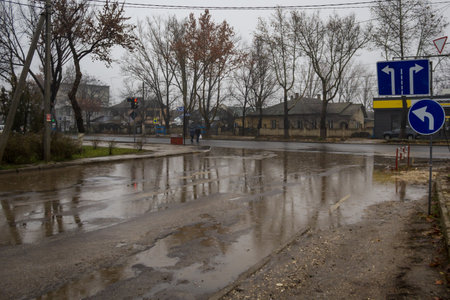 December 13, 2020 Balti Moldova mud and puddles in bad weather. Backgroundのeditorial素材