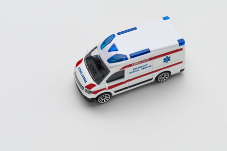January 8, 2020 Balti Moldova toy ambulance car on a light background. An important structure in the emergency services in the world.のeditorial素材