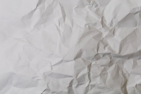 Heavily wrinkled paper background as blank for design or copy space for text.
