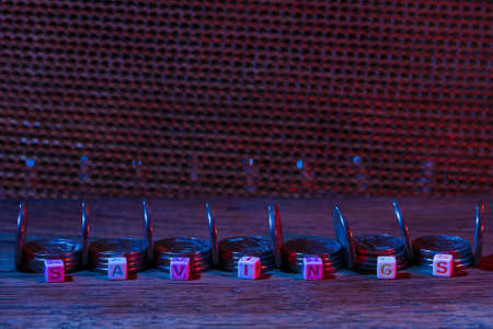 SAVINGS cubes with text in neon street cyber world of darkness. Atmospheric concept. Abstract...