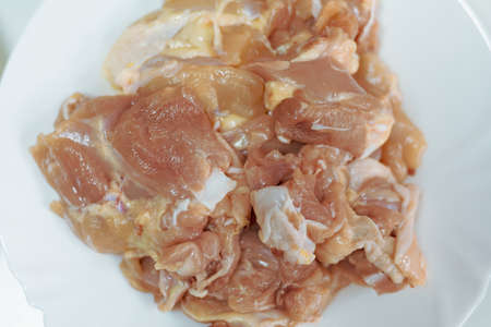Raw chicken fillet. Home cooking. Background with place for inscriptions or text. Copy space