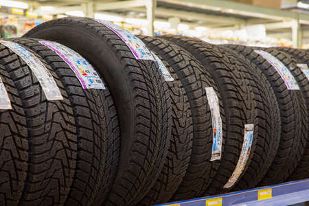 February 11, 2021 Balti Moldova Huge chain supermarket, illustrative editorial. Automobile Tire Departmentのeditorial素材