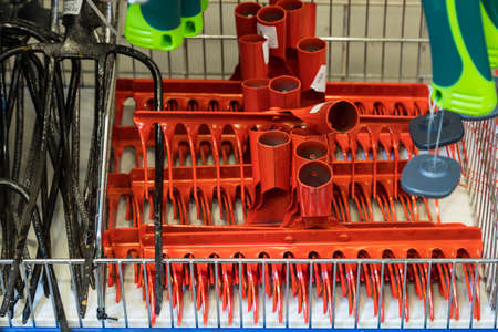 February 24, 2021 Balti Moldova. Huge supermarket, garden department. Showcase with garden hand...