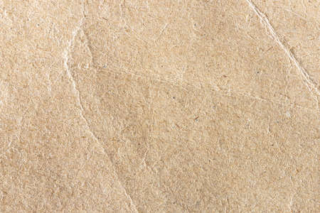 Old vintage paper. Rough textured surface as background or blank for design. Graphic resource.