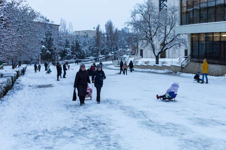 February 1, 2021 Balti or Beltsy, Moldova evening sledding on the citys central hill. Illustrative editorial. Backgroundのeditorial素材