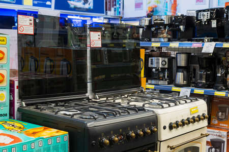 March 23, 2021 Balti Moldova supermarket or wholesale hypermarket. Department of goods for the kitchen. Illustrative editorial. Showcase with gas stovesのeditorial素材