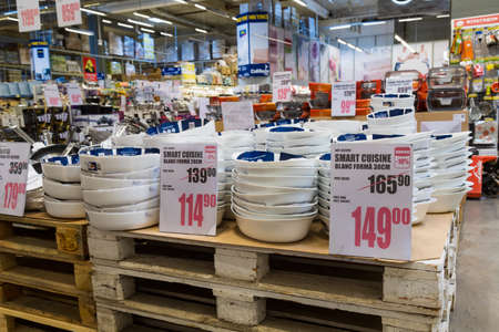 March 23, 2021 Balti Moldova supermarket or wholesale hypermarket. Department of goods for the kitchen. Illustrative editorial. Showcase with dishes and platesのeditorial素材