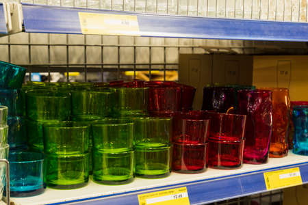 March 23, 2021 Balti Moldova supermarket or wholesale hypermarket. Department of goods for the kitchen. Illustrative editorial. Glass multi-colored dishesのeditorial素材