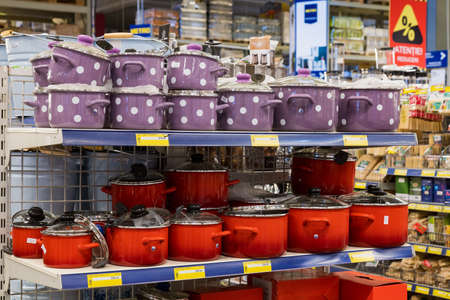 March 23, 2021 Balti Moldova supermarket or wholesale hypermarket. Department of goods for the kitchen. Illustrative editorial. Showcase with cooking pansのeditorial素材
