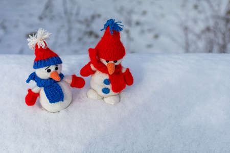 Snowman as the main symbol of winter among the peoples of the northern hemisphere of the planet. Background with place for text or inscriptions.の写真素材