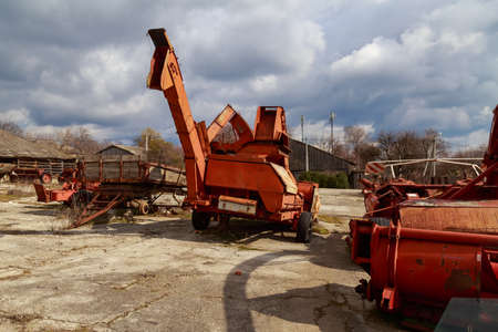 Devastation and decline in the agro-industrial sector. Cemetery of old rusty agricultural machinery....