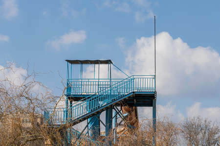An empty lifeguard tower on the beach without staff and people during the covid-19 pandemic, backgroundの写真素材