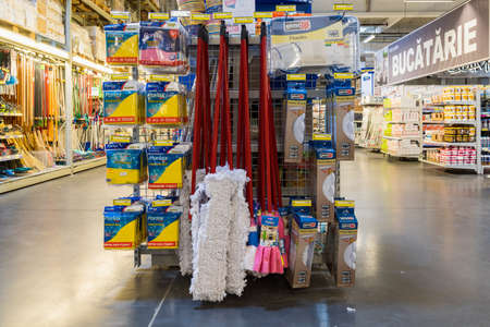 March 31, 2021 Balti Moldova, Supermarket or wholesale store by type of warehouse, department of cleanliness and household chemicals. Illustrative editorial. Showcase with mopsのeditorial素材
