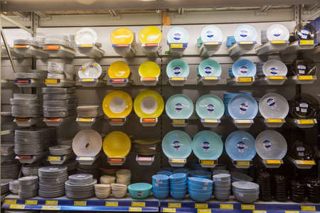 March 23, 2021 Balti Moldova supermarket or wholesale hypermarket. Department of goods for the kitchen. Illustrative editorial. Showcase with dishes and platesのeditorial素材