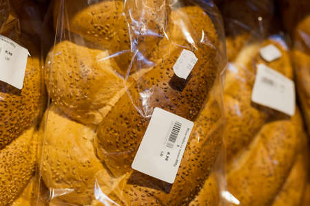 April 1, 2021 Balti Moldova, Food supermarket. Illustrative editorial. Bread is a socially significant product. Selective focus with blurのeditorial素材