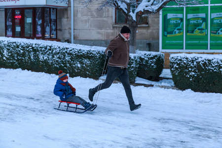 February 1, 2021 Balti or Beltsy, Moldova evening sledding on the citys central hill. Illustrative editorial. Backgroundのeditorial素材