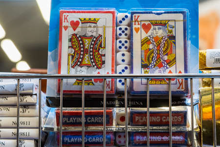 April 12, 2021 Beltsy, Moldova goods on the market shelf. Supermarket showcase. Illustrative editorial. Playing cardsのeditorial素材