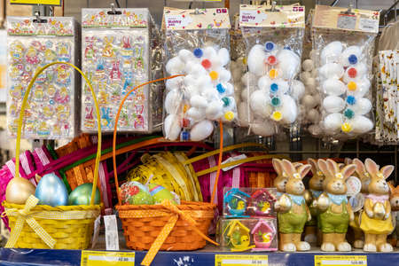 April 22, 2021 Beltsy Moldova goods on the market shelf. Supermarket showcase. Illustrative editorial. Easter decorative accessories and attributesのeditorial素材