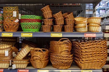 April 22, 2021 Beltsy Moldova goods on the market shelf. Supermarket showcase. Illustrative editorial. Wicker basketsのeditorial素材