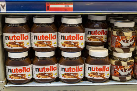 April 22, 2021 Beltsy Moldova goods on the market shelf. Supermarket showcase. Illustrative editorial. Chocolate nut butterのeditorial素材