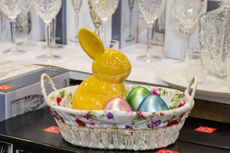 April 22, 2021 Beltsy Moldova goods on the market shelf. Supermarket showcase. Illustrative editorial. Hare or rabbit in a basket with eggs. Easter main symbolのeditorial素材